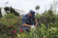 Chief petty officer selects cleaning the grounds of the Veterans Museum and Memorial Center