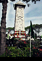 Victory War Memorial in Chennai, India, with colorful garden