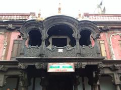 Entrance of Vishrambaug Wada with intricate woodwork