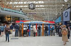 Waterloo Station interior with commuters