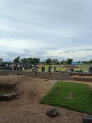 Fort Warangal ruins with ancient stone structures and greenery