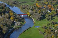 Kissing bridge over a serene river