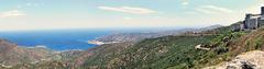 View of the bay of Llançà and Port de la Selva in northern Cap de Creus, with Sant Pere de Rodes Abbey to the right, Spain