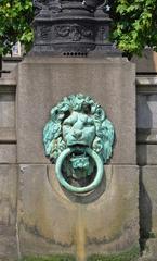 Lion head sculpture with mooring ring at Westminster Pier