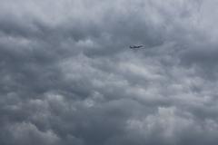 Aircraft flying above Westminster Pier in London