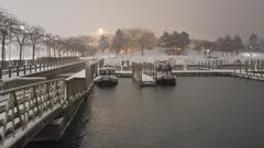 Police boats at Milliken State Park during a snow storm