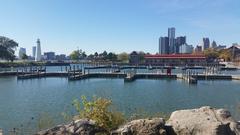 Milliken State Park and Harbor in Michigan, scenic waterfront with greenery and a lighthouse