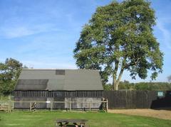 outbuilding at Home Farm with a picnic bench in the foreground