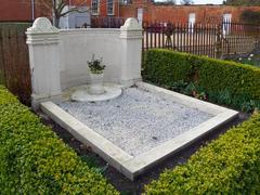 Grave of Capt George Louis St. Clair Bambridge and his wife Elsie in St Andrew's Churchyard, Wimpole