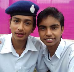 Suyash and Prince holding trophies at 2017 Inter School Chess Tournament