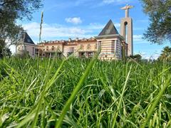 Christ the King Sanctuary in Almada with 25th of April Bridge