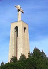 Santuário Nacional de Cristo Rei in Almada, Portugal viewed from behind and side