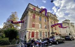 Front view of Agence Trio entrance in Lausanne with tentacles protruding outside