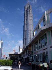 Chinese cadets returning to Luijiazui metro station with Jin Mao Tower in the background, Shanghai, 2003