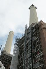 Battersea Power Station with four chimneys on the south bank of the River Thames in London