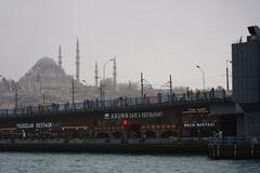 Bosphorus Strait in Istanbul with boats and buildings on a clear day