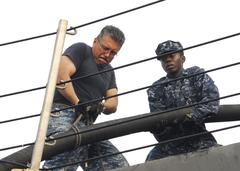 US Sailors aboard USS Freedom hauling potable water cable line during CARAT Malaysia 2013