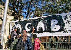 graffiti on a wall with the message 'ACAB'