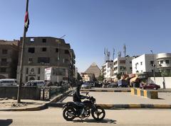 A man travels on a motorcycle in Giza, Cairo, Egypt