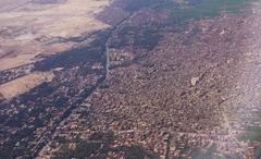 Aerial view of Cairo city with dense buildings and the Nile River