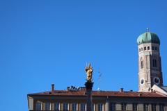 Maria on the Mariensäule and South Tower of Frauenkirche Munich