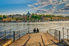 Couple sitting at the docks in Djurgården, Stockholm