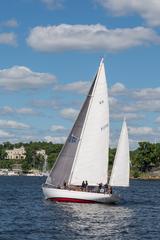 Sailboat Ballad anchored on still water