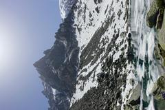 Aiguille du Peigne at Lac Bleu with hikers on the way to Montenvers at Grand Balcon Nord in Chamonix