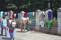 Drying area of a laundry business using a public park fence in Manali, Himachal Pradesh, India, 1989