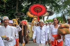 men and women participating in Mapeed tradition at Alas Kedaton forest, Bali