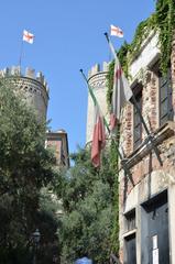 view of Christopher Columbus' house entrance and avenue leading to Porta Soprana in Genoa