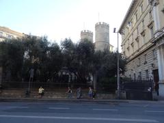 Chiostro di Sant'Andrea and Porta Soprana in Genoa, Italy, from Piazza Dante