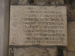 Porta Soprana monument inscription in Genoa, Italy