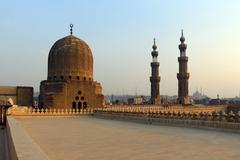 Mosque of Sultan al-Muayyad in Cairo with dome and minarets of Bab Zuweila