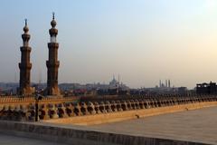 Mosque of Sultan al-Muayyad in Cairo with dome and minarets of Bab Zuweila