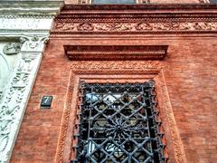 Detail of window and portal of palazzo Bagatti Valsecchi in Milan