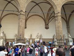 Panoramic view of Florence, Italy with iconic landmarks like the Florence Cathedral and Ponte Vecchio