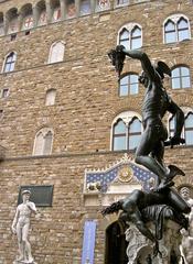 Piazza della Signoria with Perseus statue, David replica, and Palazzo Vecchio in Florence