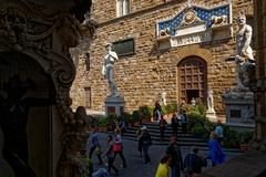 Florence Loggia dei Lanzi with Michelangelo's David, Palazzo Vecchio entrance, and Bandinelli's Hercules