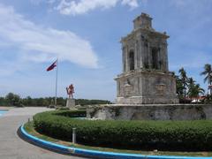 Mactan Shrine Magellan marker corner with Lapulapu monument and flag