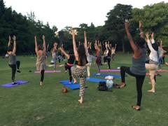 Expats meeting for yoga at Zhongshan Park in Shanghai, May 2017