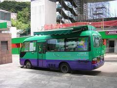 a mini bus on the street in Hong Kong