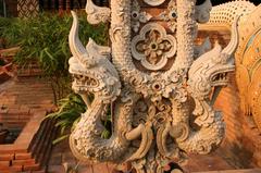 Elaborately carved Naga sculptures at Wat Lok Molee in Chiang Mai, Thailand