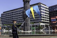 Flag bearer at the changing of the guard in Stockholm