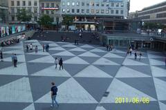 People walking at Sergels Torg on a very warm Monday evening, Sweden's National Day