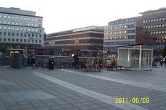 People strolling at Sergels Torg on a warm Monday evening, Sweden's National Day