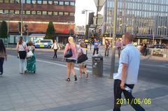 People strolling at Sergels Torg on a very warm Monday evening, Sweden's National Day