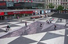 Mind your step photo illusion at Sergels torg by Erik Johansson