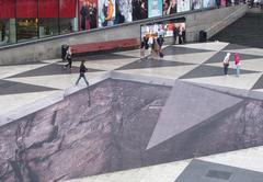 Mind your step photo illusion at Sergels torg by Erik Johansson