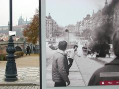 Street scene in Prague with poster of 1968 Soviet invasion